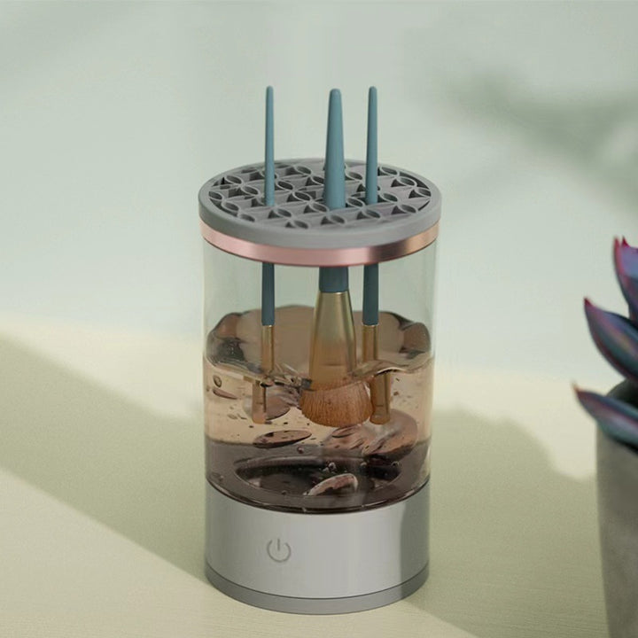 Electric makeup brush cleaner spinning a brush