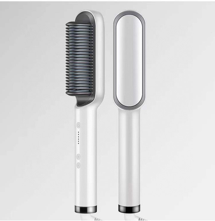 Black heated straightening comb on dressing table