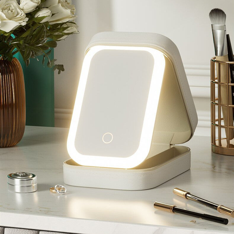 Makeup case with lit mirror open